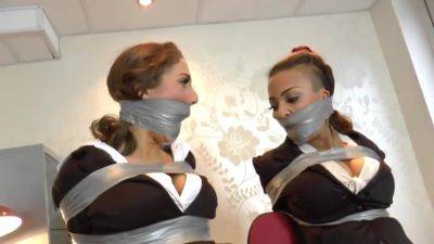 gina and ruby taped up in chair - upornia - Britain